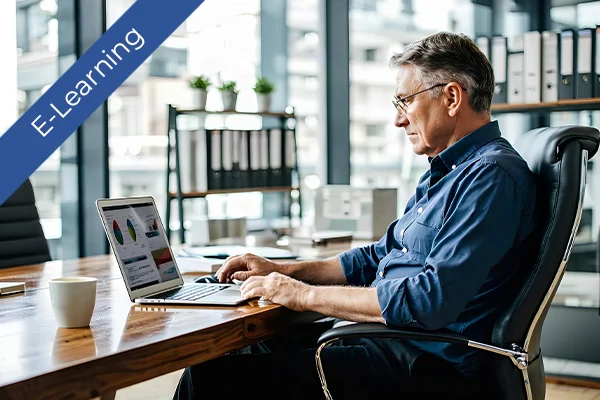 A professional uses a laptop for e-learning in a modern office. Ideal for health and safety training.