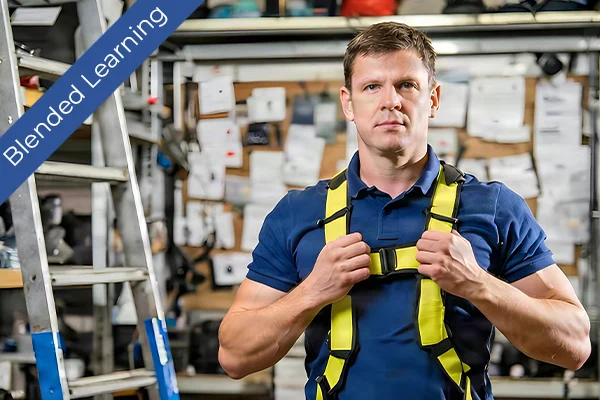 A worker adjusting a safety harness in an industrial setting with a 'Blended Learning' banner. Focused demonstration of workplace safety equipment.